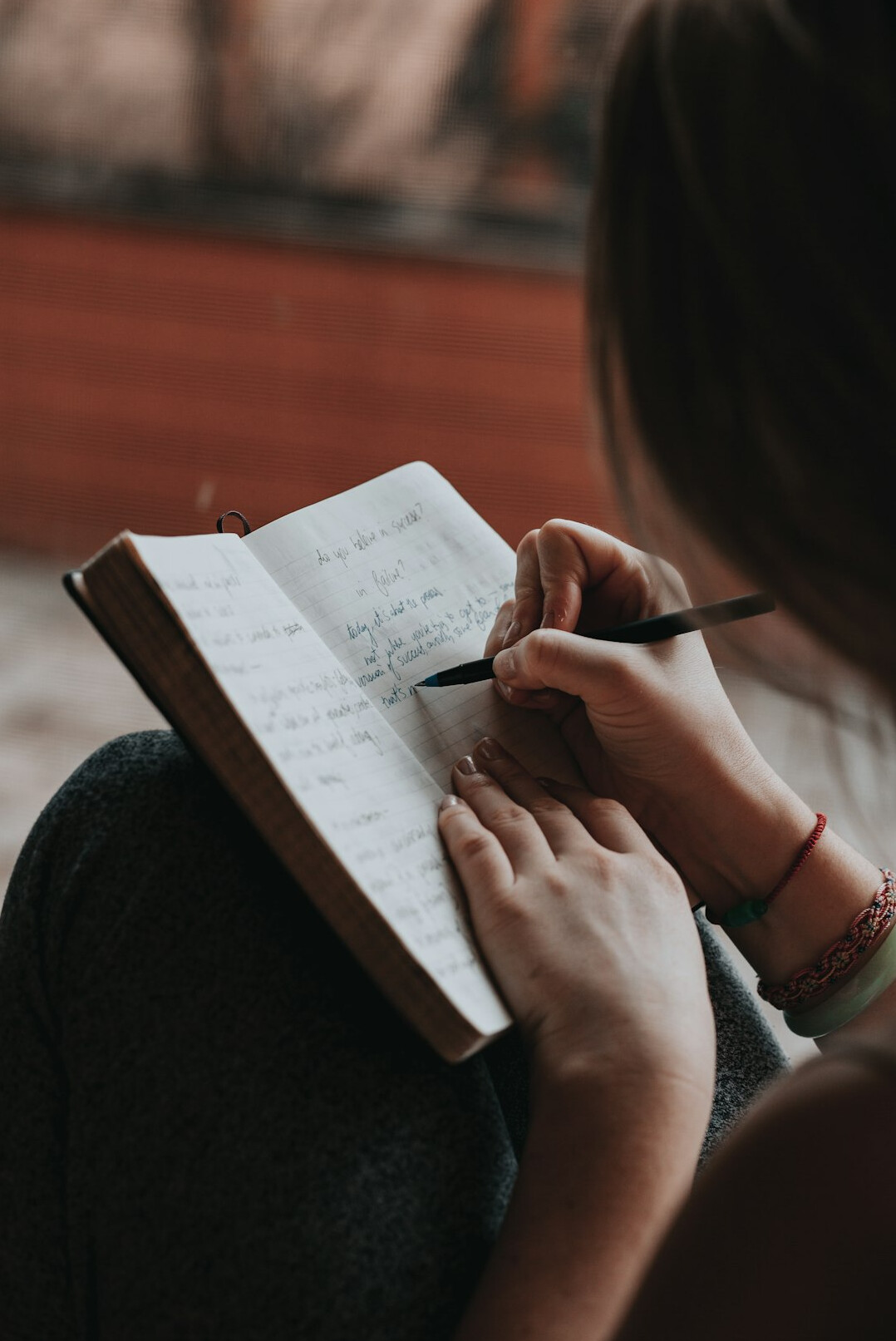 writer revising manuscript